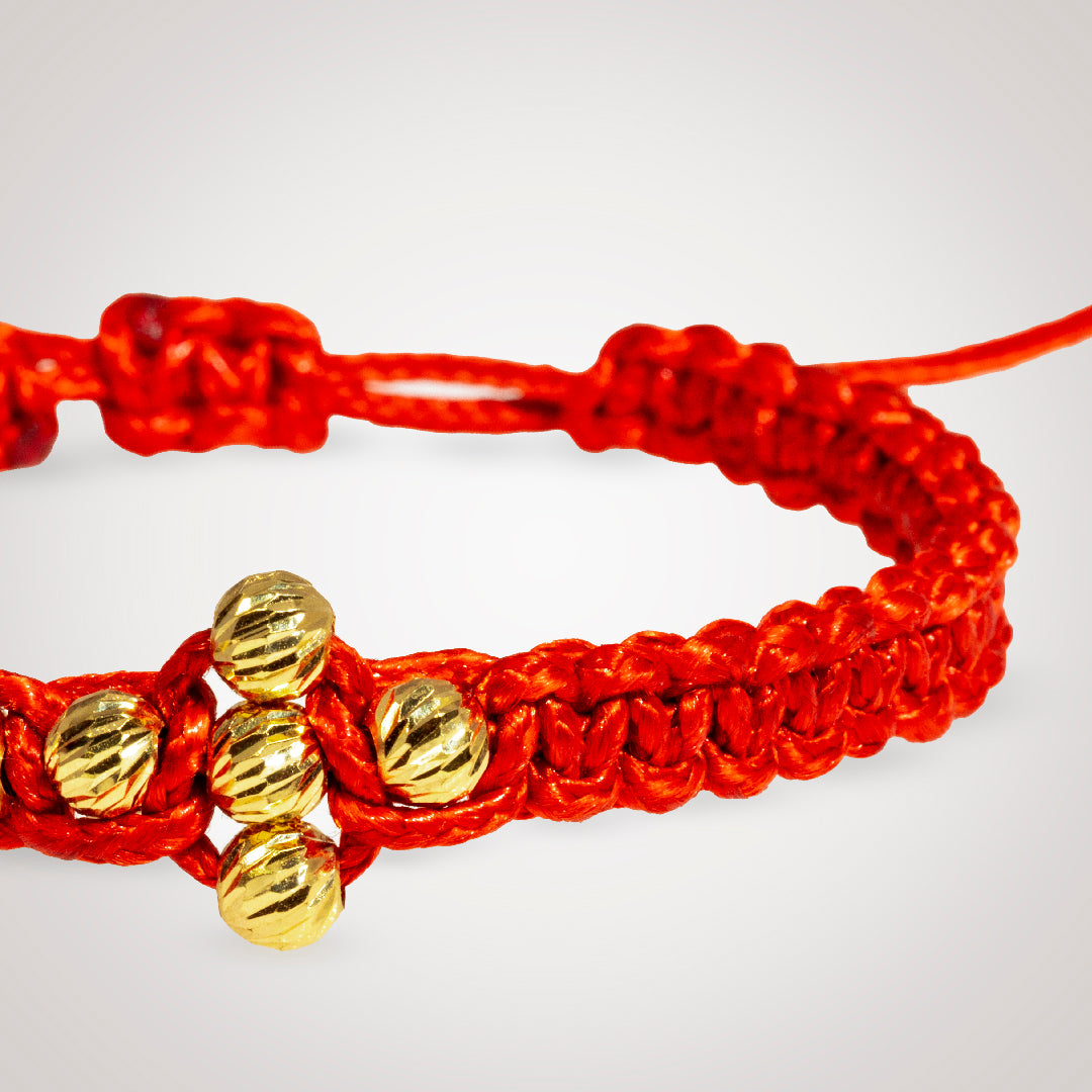 Pulsera Cross Catriel con bolas en oro diamantado de 18K