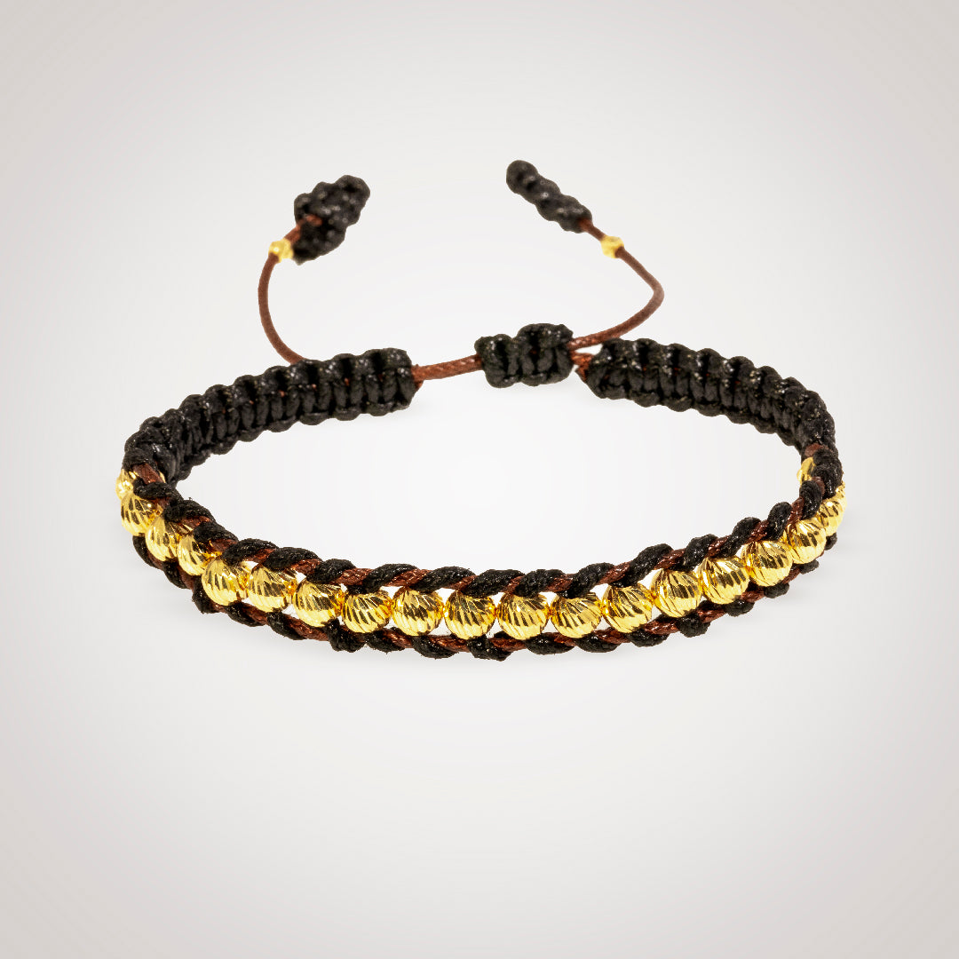 Pulsera Tirson negro con bolas en oro diamantado de 18K