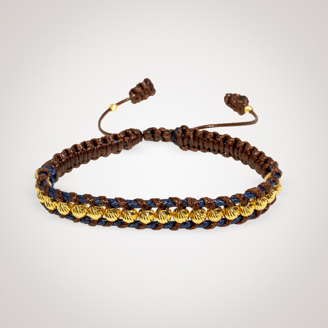 Pulsera Tirson café con bolas en oro diamantado de 18K